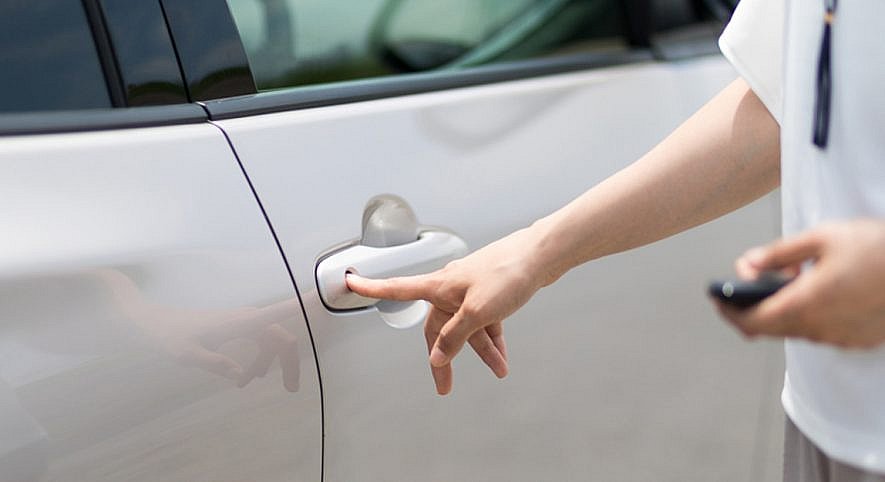 Automatic lift gates and biometric vehicle access feature